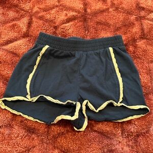 Tea shorts. Size 5. Navy blue with white lace detail.